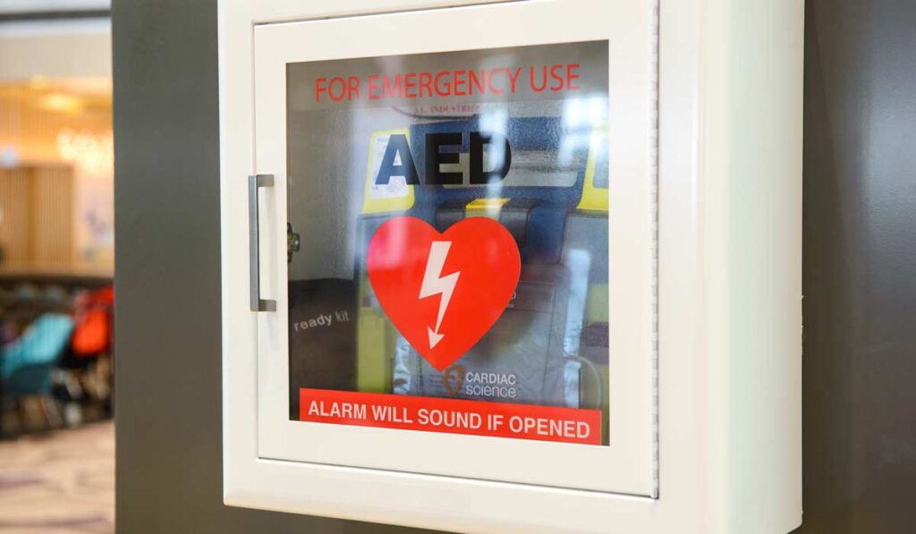 Picture of AED device on a wall in a hospital