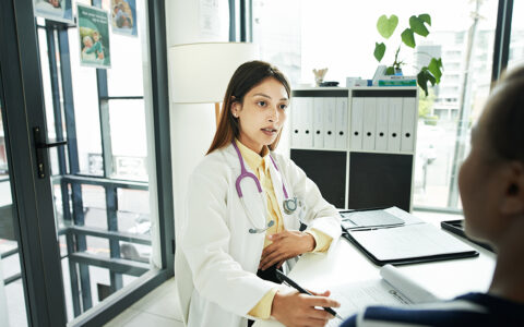 Doctor talking to patient