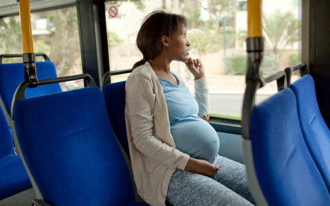 Pregnant Woman on bus