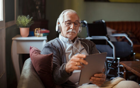 Older adult using iPad