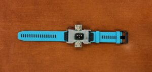 A custom sensor worn on a watchband that resembles a smartwatch.