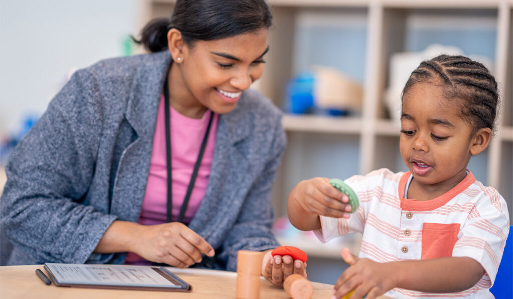 Black or mixed race child in occupational or play therapy