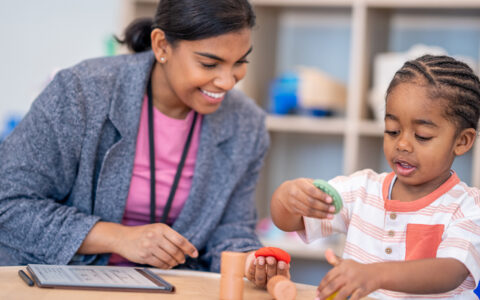 Black or mixed race child in occupational or play therapy