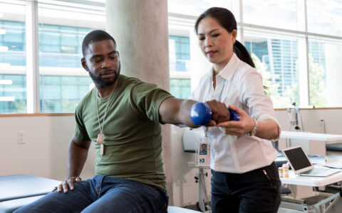 injured soldier in physical therapy