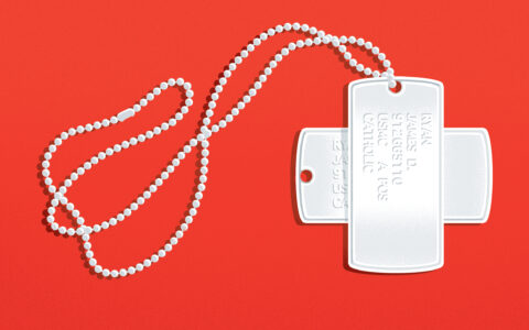 Veterans' dog tags in the shape of a medical cross